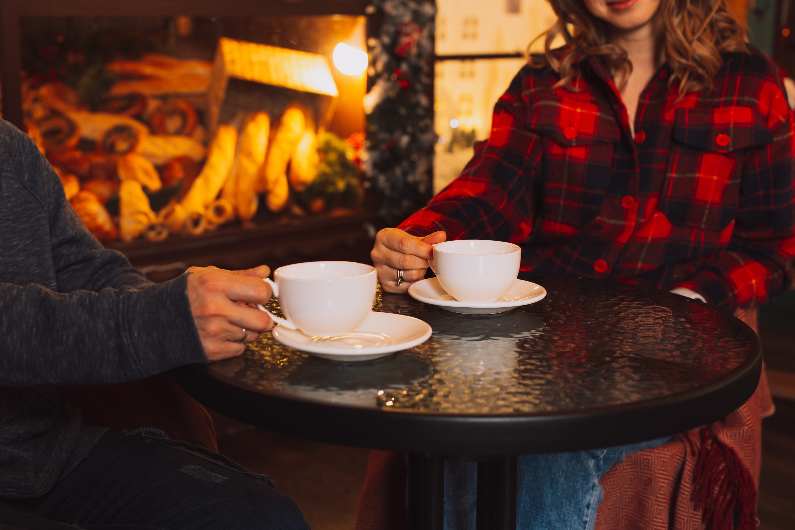 Why Coffee Shops Are the Perfect First-Date Spot 11 man and woman drinking coffee at a table near the 2024 11 27 09 48 08 utc scaled