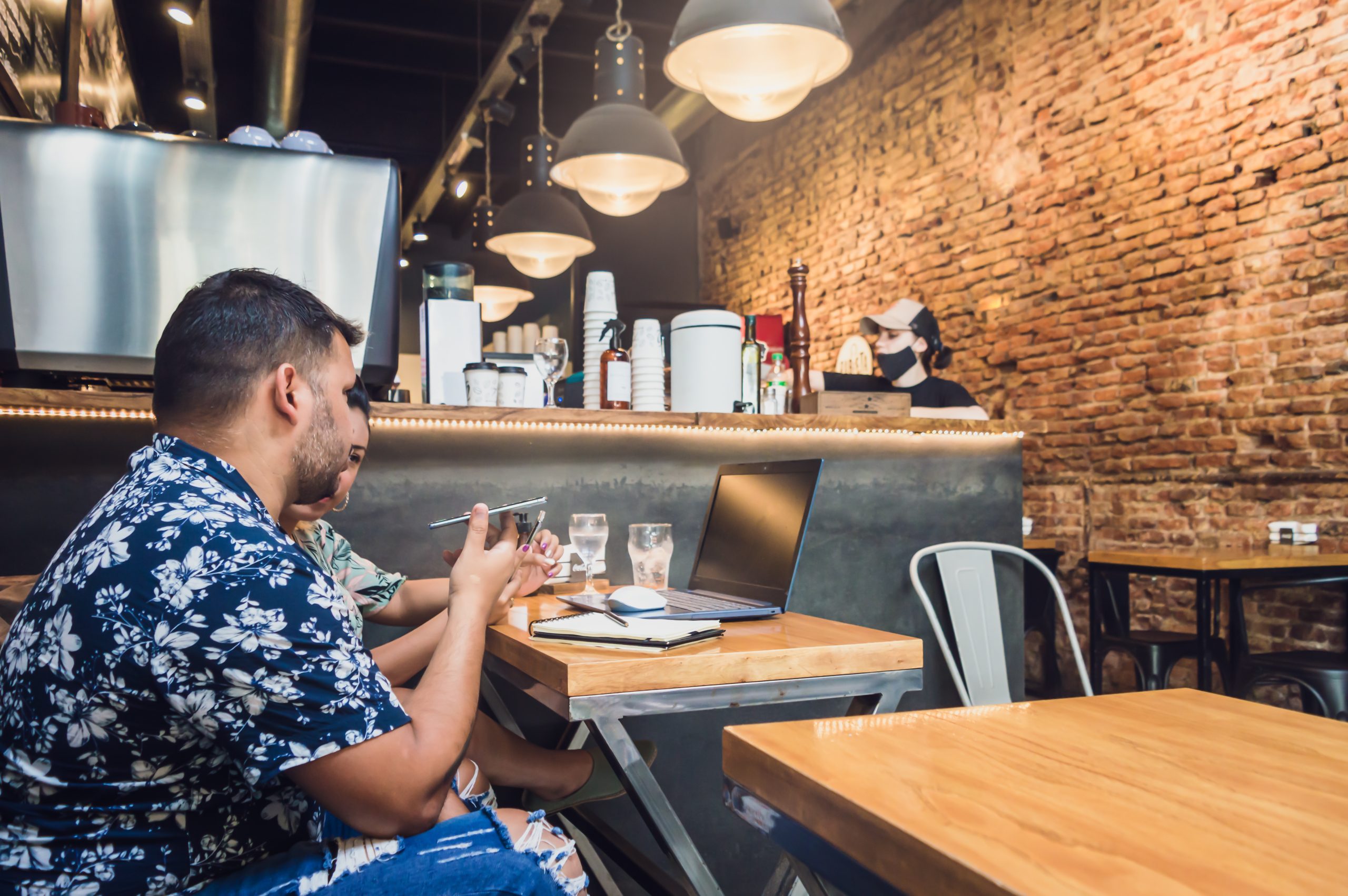 Top Work-Friendly Cafés in Chicago for Freelancers 9 young latin male and female couple freelancers wor 2025 03 05 06 33 18 utc scaled